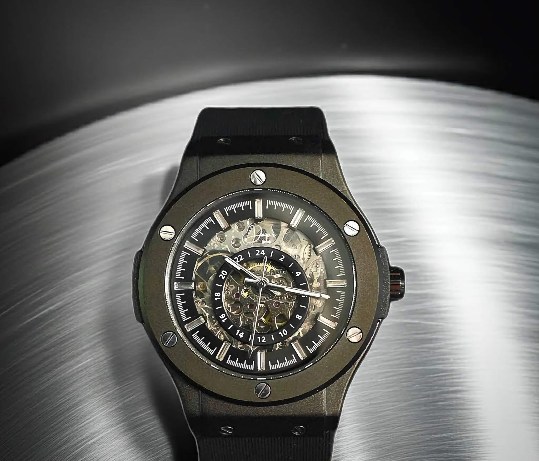 Skeleton Automatic Movement — See-through dial and exhibition caseback reveal the full mechanical engine